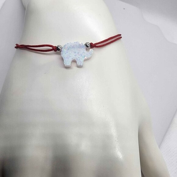 Lucky Glow – White Opal Elephant on Red String Bracelet - Picture 2 of 3